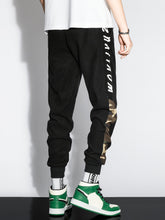 Charger l&#39;image dans la galerie, Love God. Store Men Pants Men Letter Camo Print Drawstring Waist Tapered Pants price
