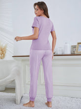 Charger l&#39;image dans la galerie, Love God. Store Women Sleepwear Eyelash Letter Graphic Tee Striped Pants PJ Set price
