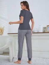 Charger l&#39;image dans la galerie, Love God. Store Women Sleepwear Eyelash Letter Graphic Tee Striped Pants PJ Set price
