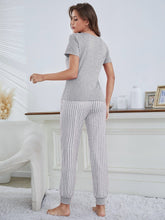 Charger l&#39;image dans la galerie, Love God. Store Women Sleepwear Eyelash Letter Graphic Tee Striped Pants PJ Set price
